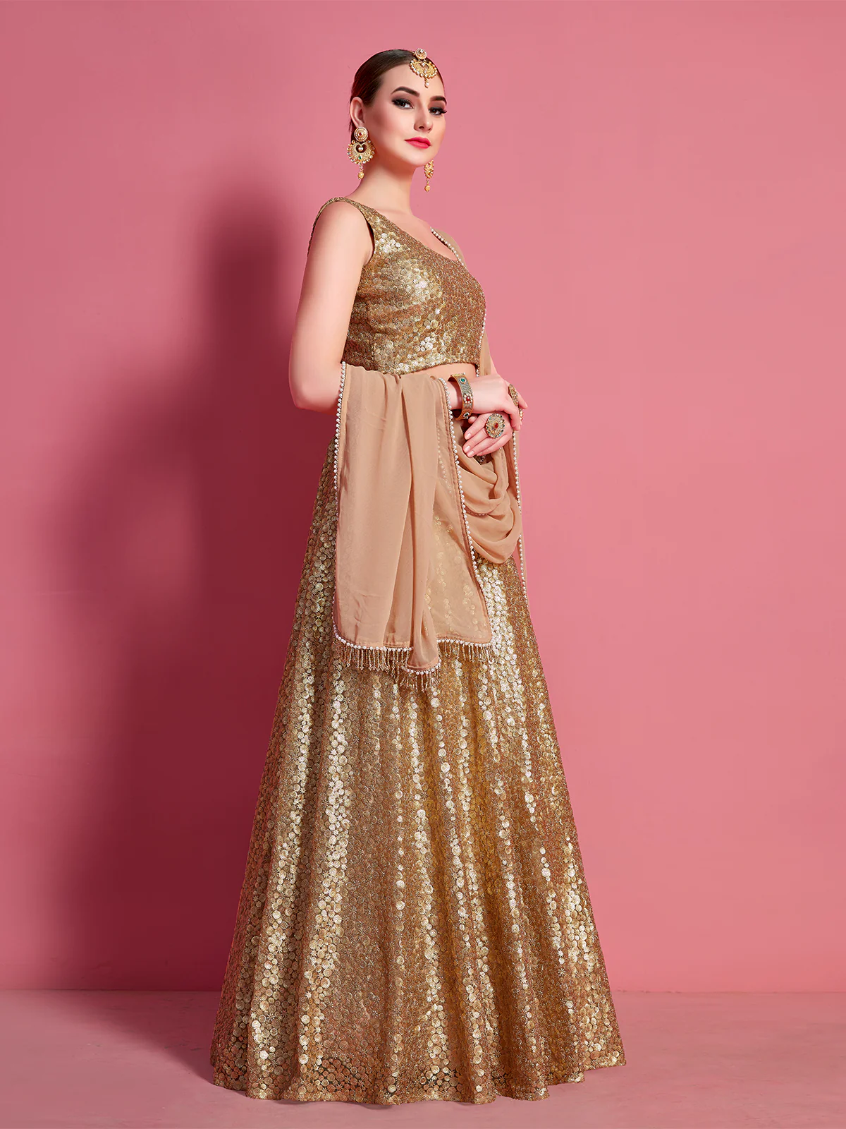 Odette Women Golden Soft Net Semi Stitched Lehenga With Unstitched Blouse - Image 3
