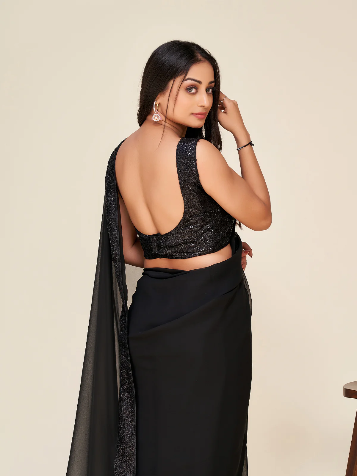 Odette Women Black Georgette Embellished Saree With Unstitched Blouse - Image 4