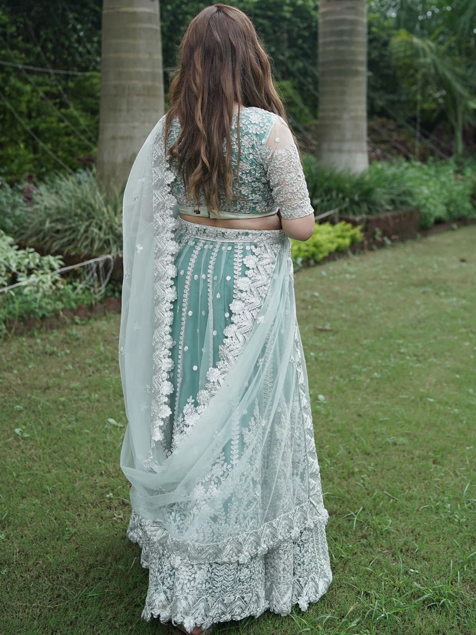 Odette Women Green Net Semi Stitched Lehenga With Unstitched Blouse - Image 4