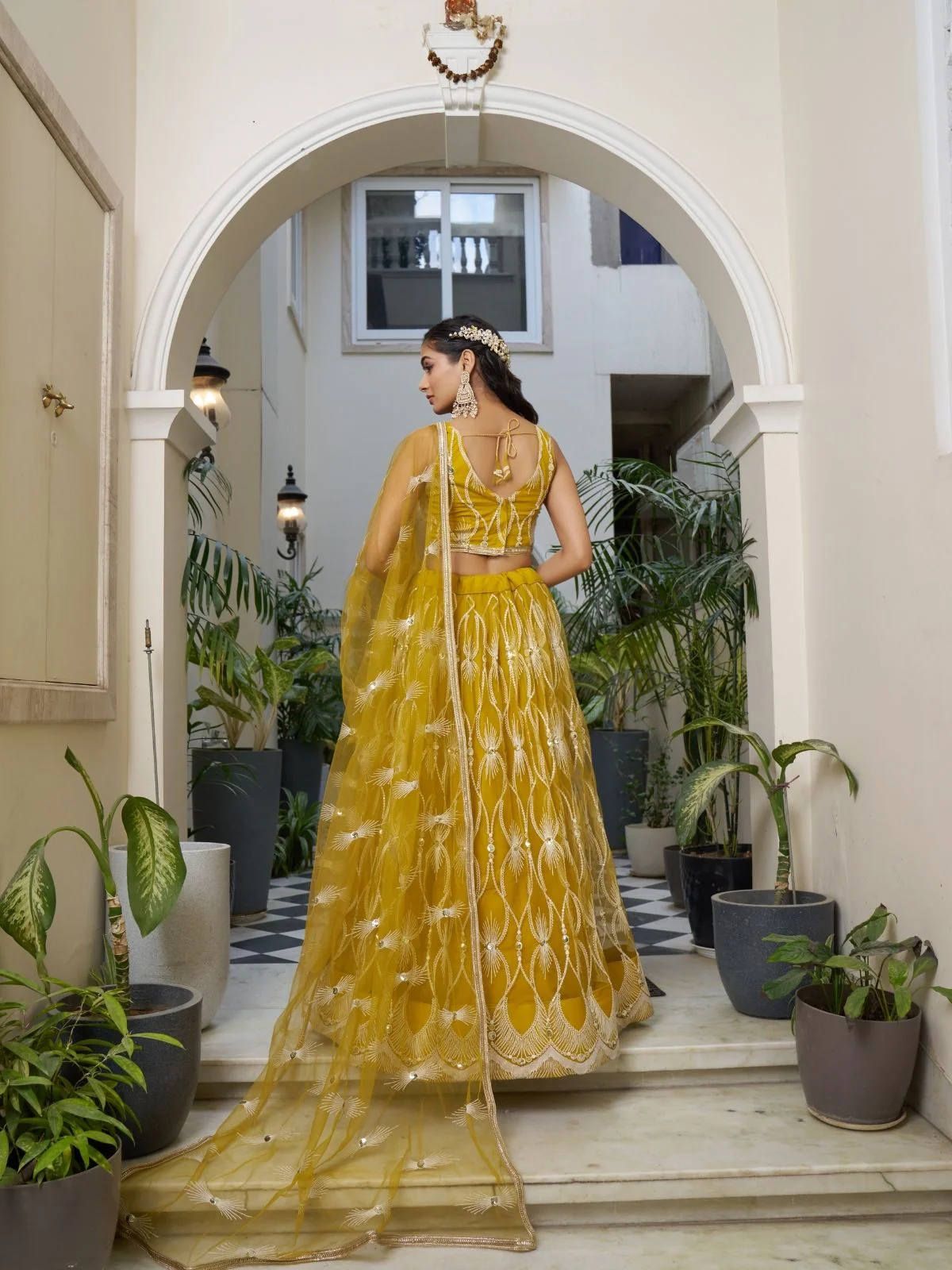 Odette Mustard Net Embroidered Semi Stitched Lehenga For Women - Image 3