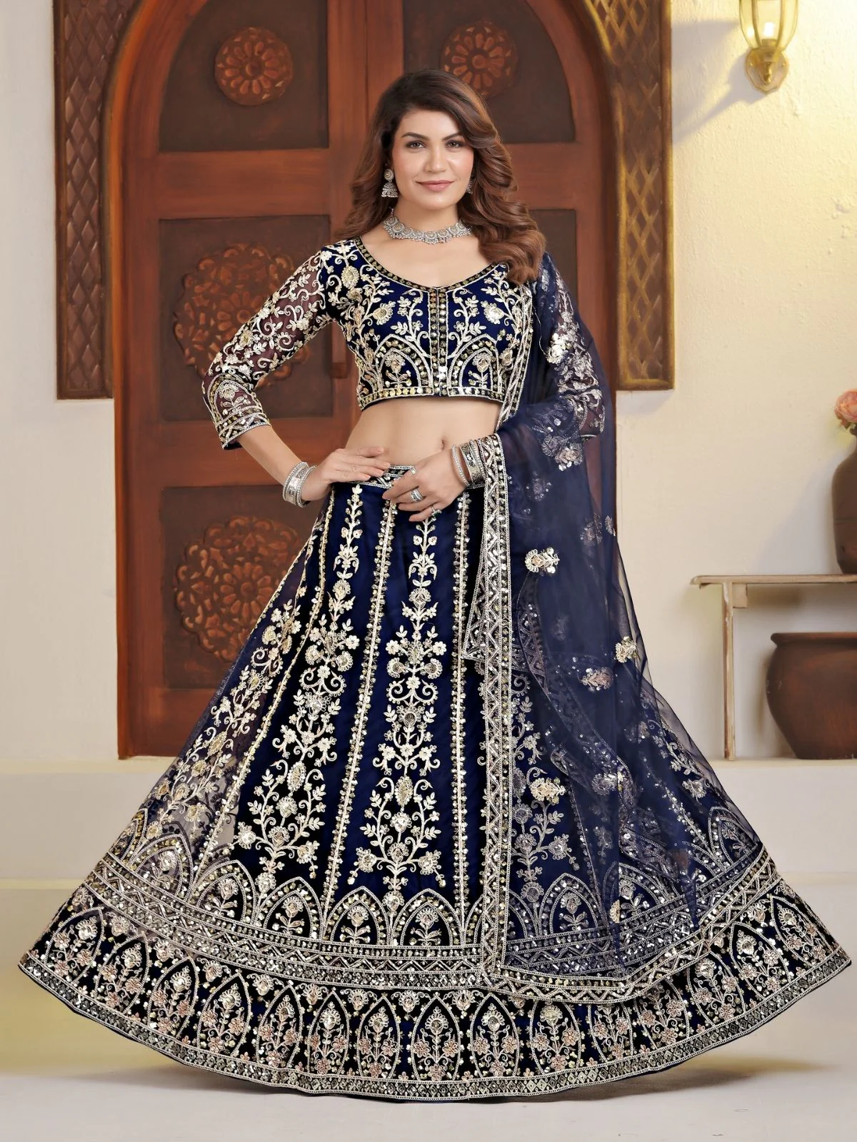 Odette Navy Blue Net Embellished Semi Stitched Lehenga For Women