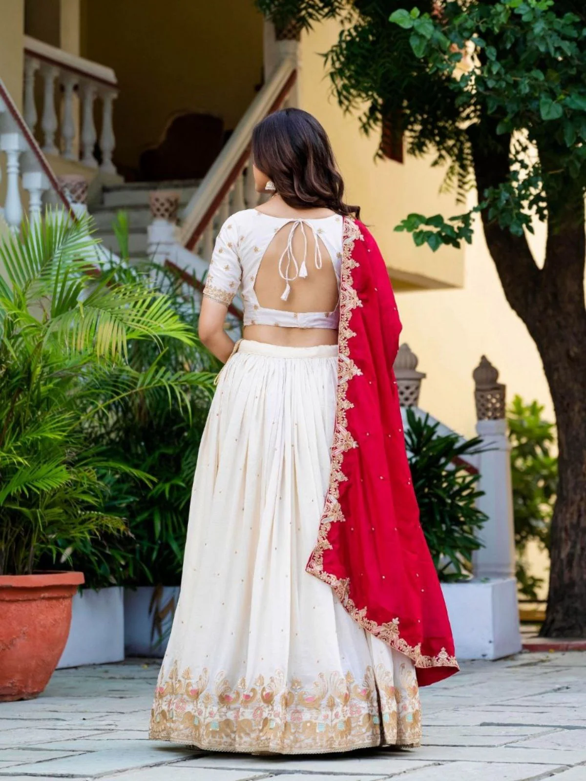 Odette Off White Silk Blend Embellished Semi Stitched Lehenga For Women - Image 3