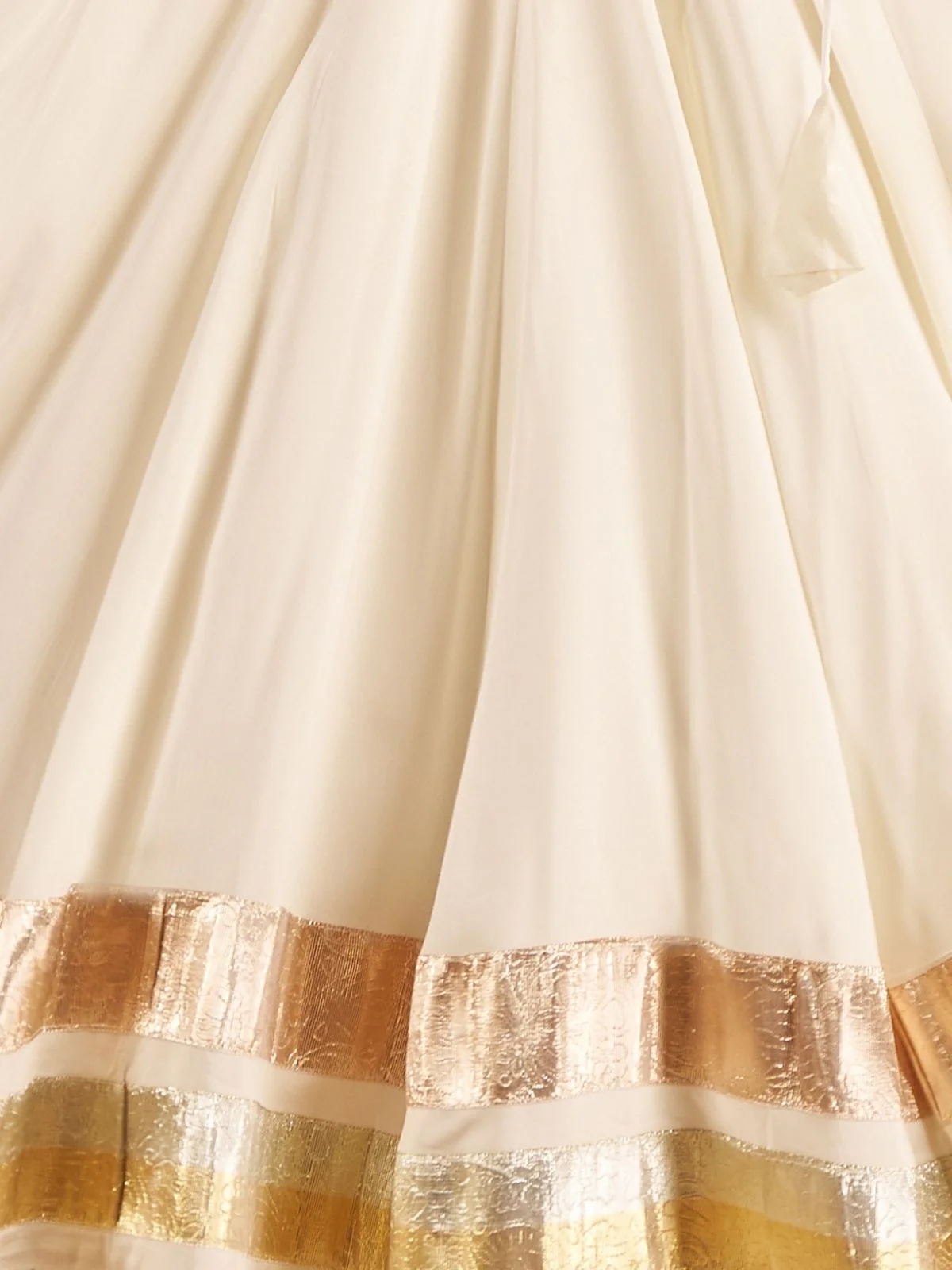 Odette Off White Viscose Rayon Embroidered Semi-Stitched lehenga With Stunning Tassels For Women - Image 7