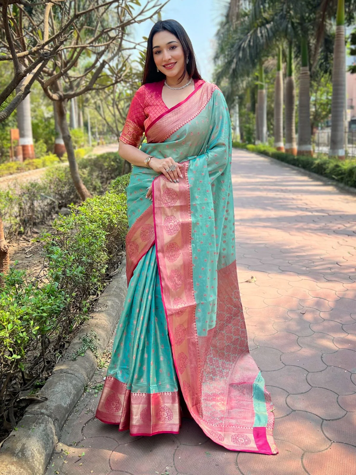 Odette Teal Woven Design Tissue Silk Saree With Unstitched Blouse For Women