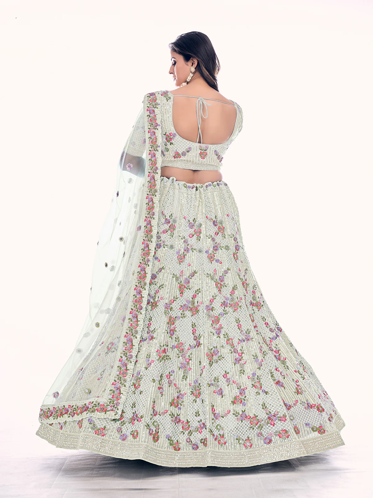 Odette White Embroidered Soft Net Semi Stitched Lehenga With Blouse For Women - Image 4