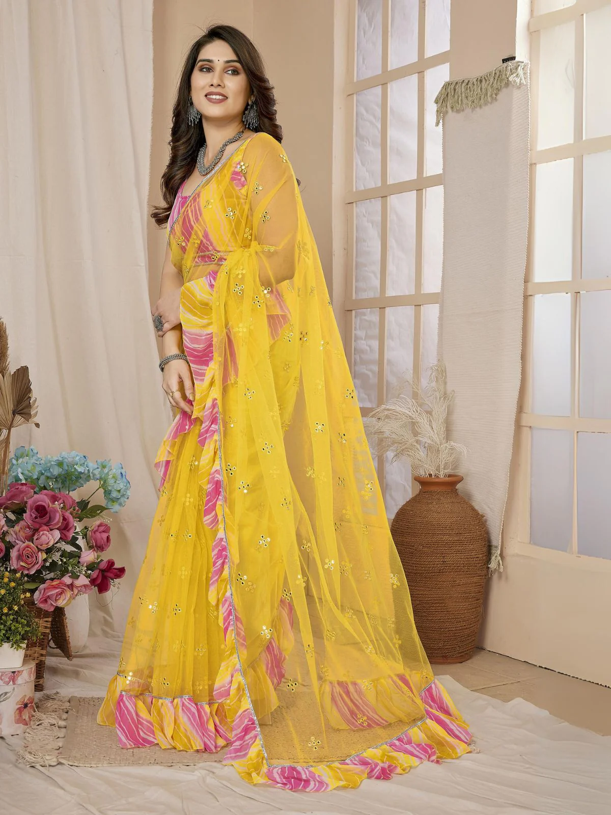 Odette Women Yellow Net Mirror Work Saree With Unstitched Blouse - Image 4