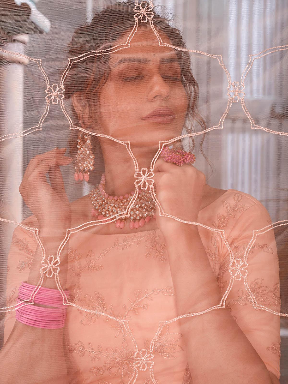 Odette Women Striking Peach Net Semi Stitched Lehenga With  Unstitched Blouse - Image 4