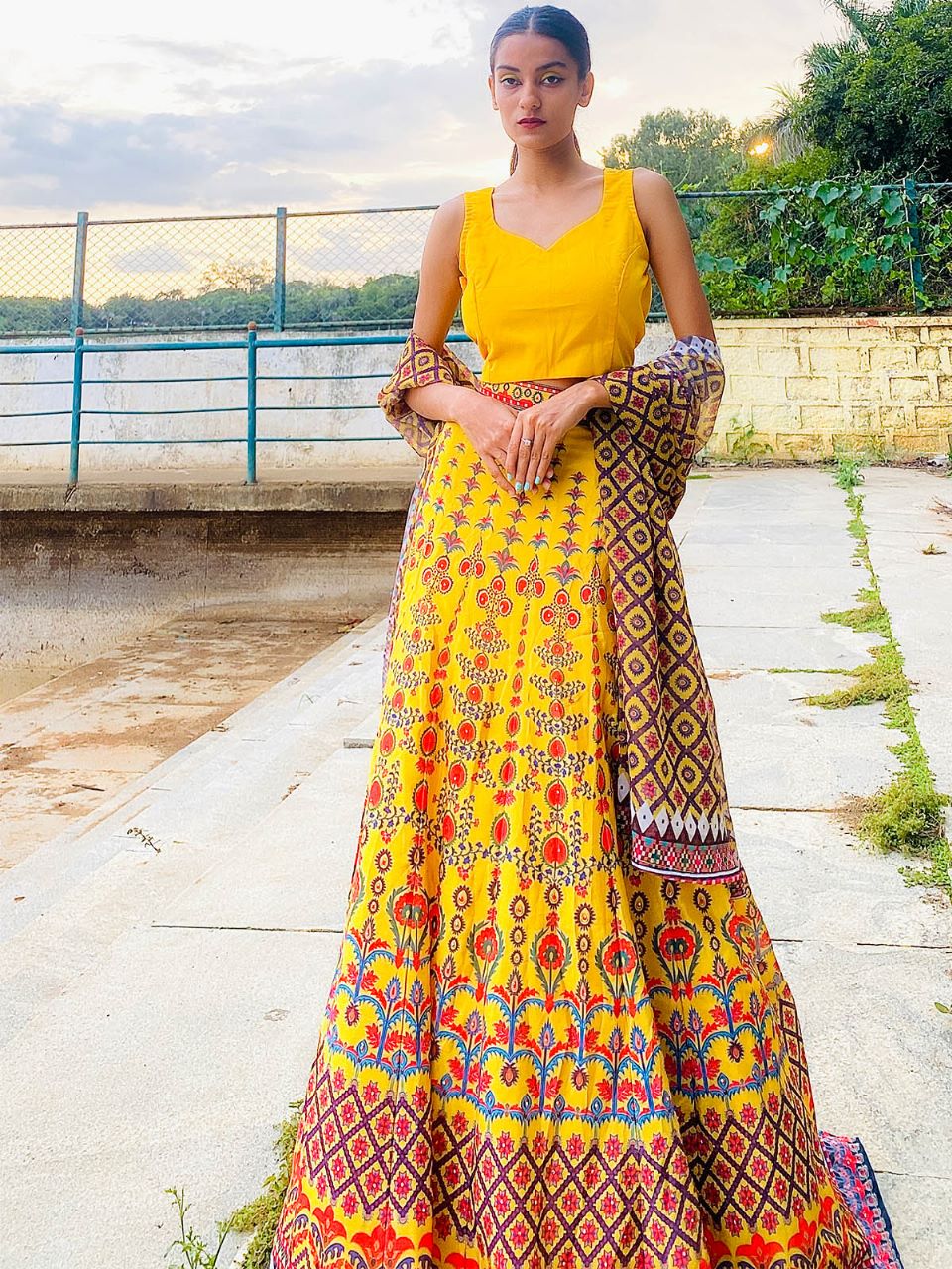 Odette Women Yellow Printed Polyester Stitched Lehenga Choli - Image 4