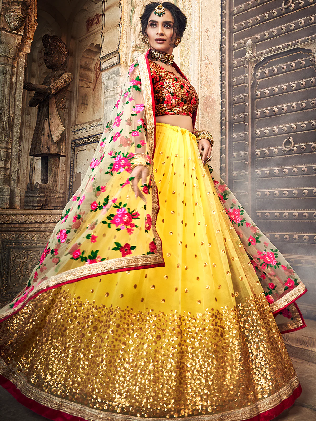 Odette Women Yellow Embroidered Soft Net Semi Stitched Lehenga With Unstitched Blouse - Image 2